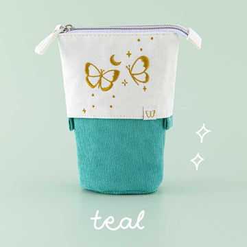 Tsuki ‘Flutter + Dream’ Pop-Up Pencil Case by Notebook Therapy x Pelinkan in teal in mint background